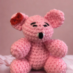 Pink crocheted teddy bear